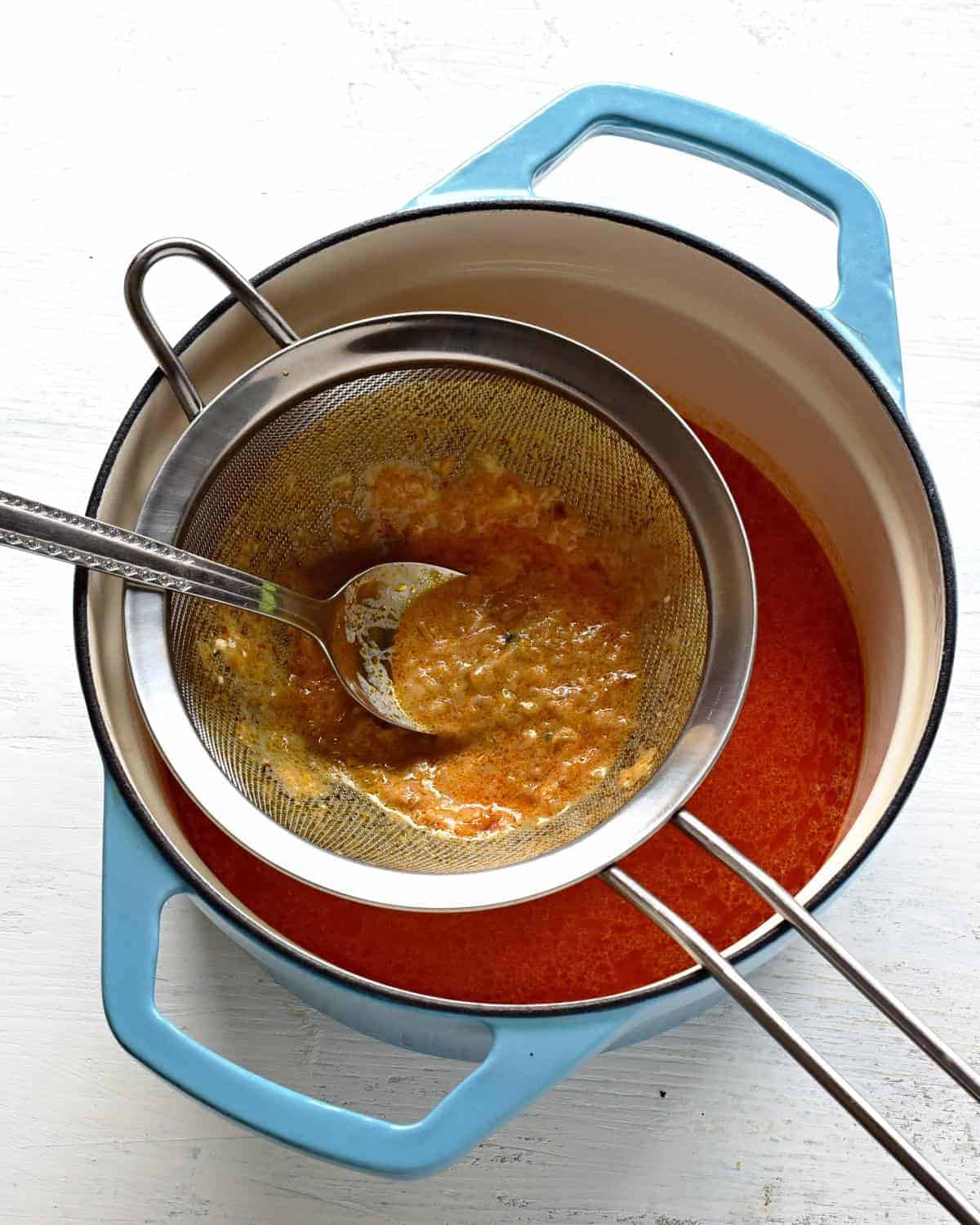 strain the chicken paprikash through a sieve