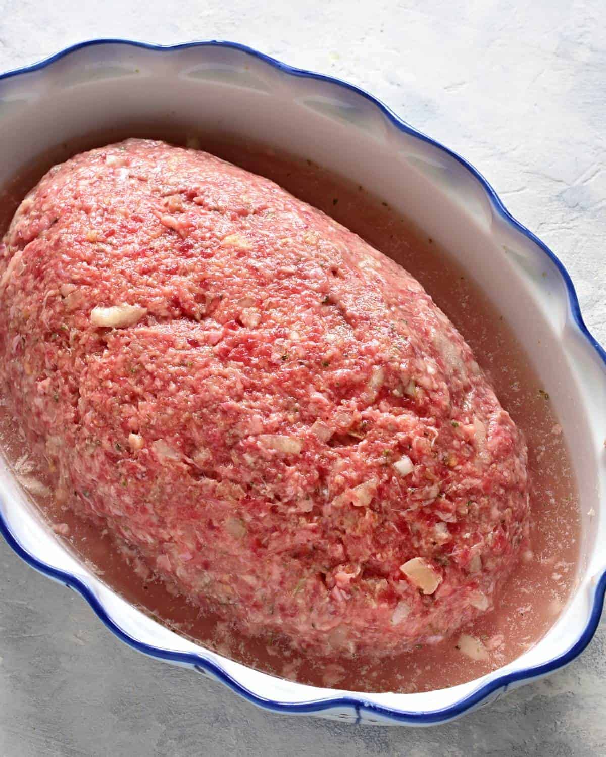 czech sekaná meatloaf in a pan before baking