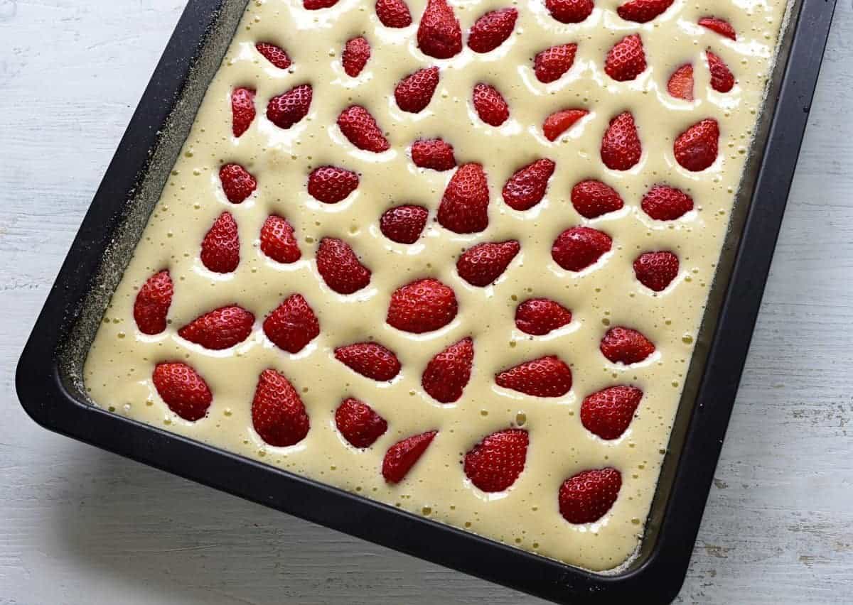 strawberry coffee cake in a baking sheet