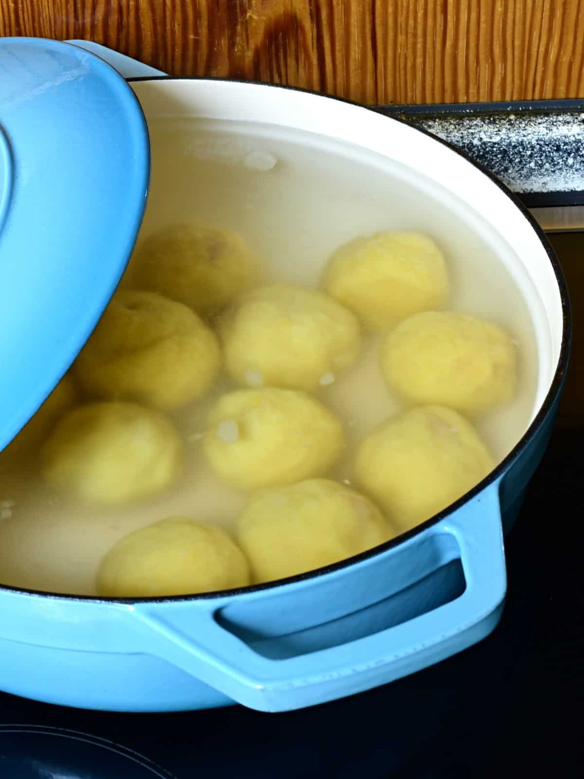 cooking duplings in a pot