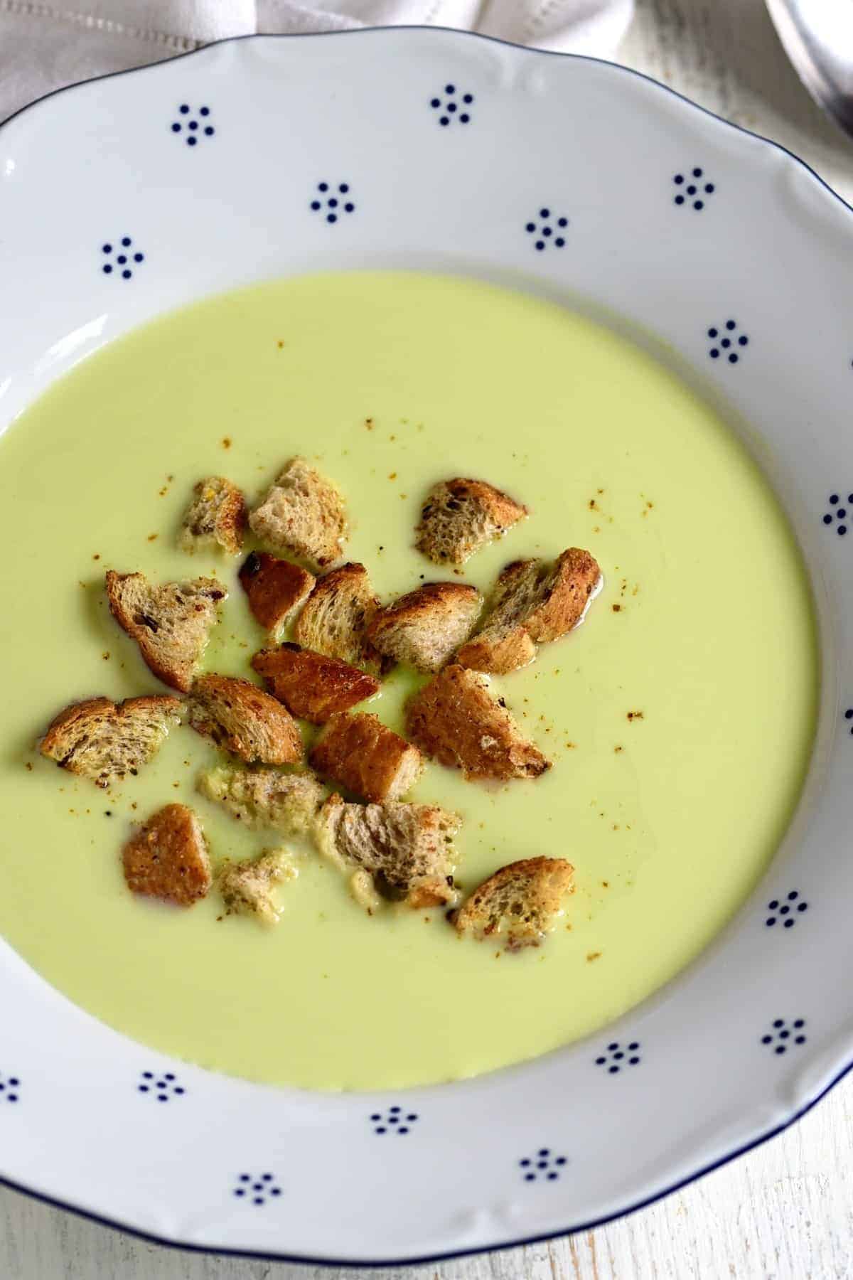 Bread croutons in pea soup.