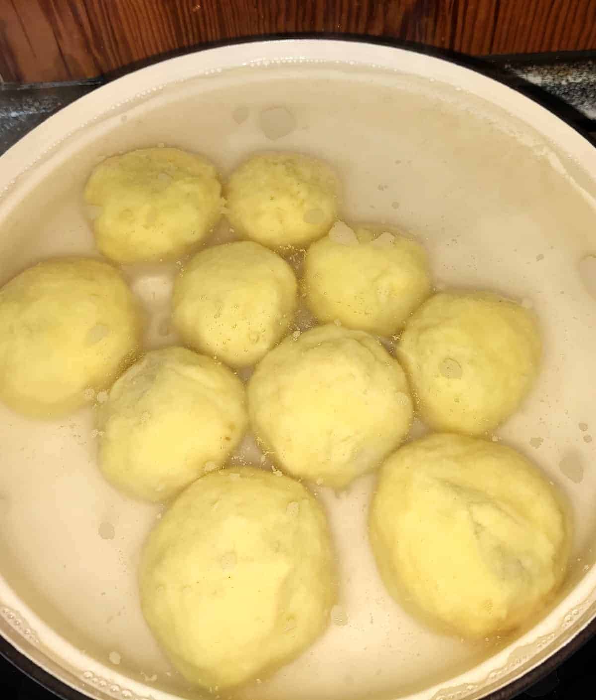 Cooking dumplings in a pan.