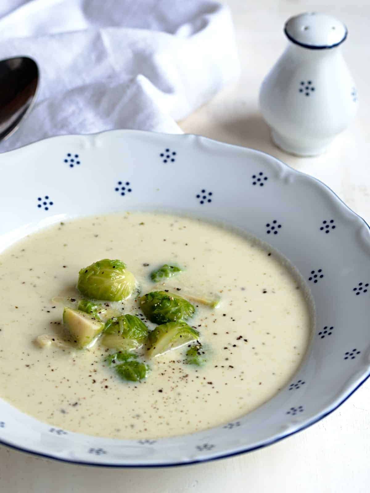 Czech-style brussels sprout soup served in a bowl.